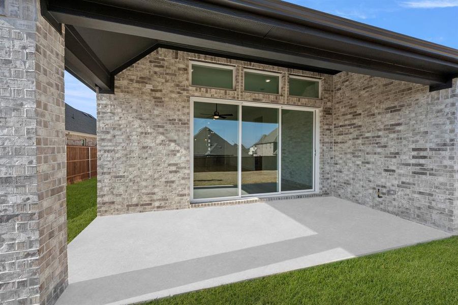 Exterior details and patio area of a home in La Frontera, Fort Worth (Image 24).