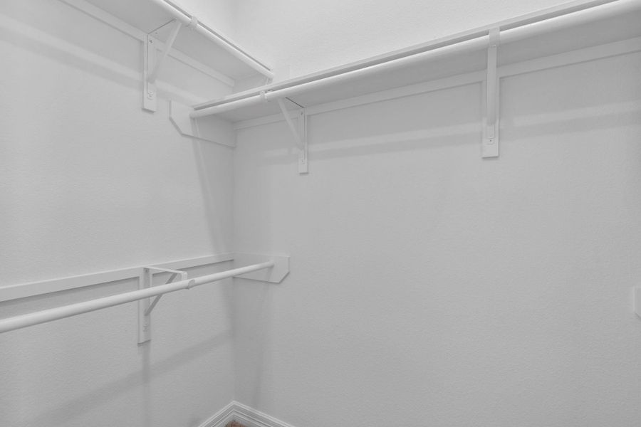 A view of your large primary walk-in Closet