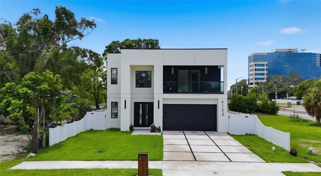 Front exterior of a new home in , Tampa, FL, highlighting curb appeal (Image 2). Front exterior of a new home in , Tampa, FL, highlighting curb appeal (Image 2).