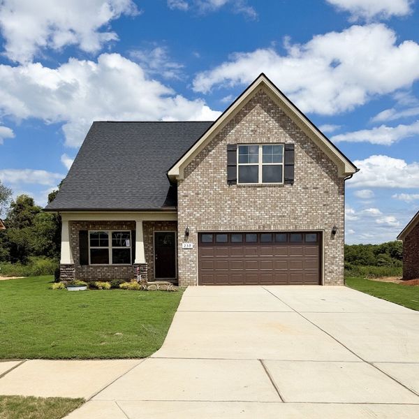 Front exterior of a new home in Bradley Bend, Ashland City, TN, highlighting curb appeal (Image 1).