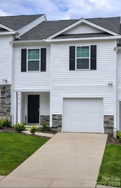 Front exterior of a new home in , Charlotte, NC, highlighting curb appeal (Image 1). Front exterior of a new home in , Charlotte, NC, highlighting curb appeal (Image 1).