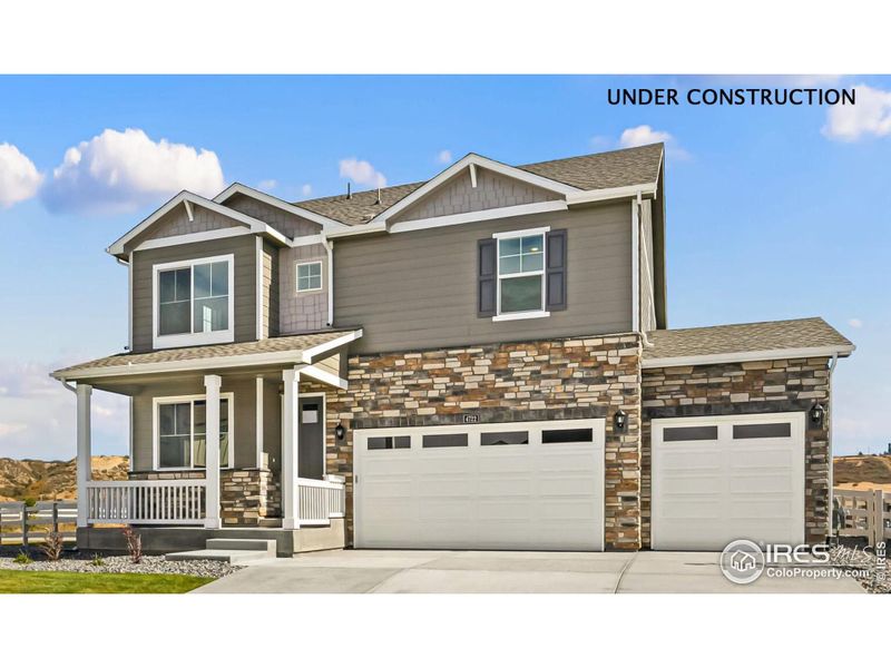 Front exterior of a new home in Lakeside Canyon, Mead, CO, highlighting curb appeal (Image 1).