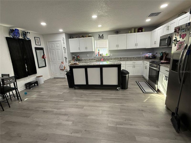 Furnished interior view inside a new home in , Mascotte (Image 5).