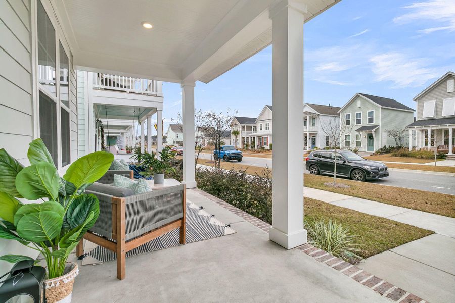 Exterior details and patio area of a home in Nexton - Midtown - The Park Collection, Summerville (Image 28).