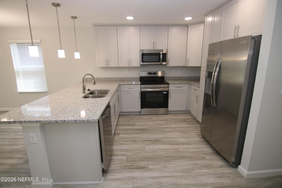 Furnished interior view inside a new home in , Jacksonville (Image 3).