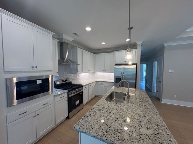 Furnished interior view inside a new home in Riverside Cove, Wilmington (Image 10). Furnished interior view inside a new home in Riverside Cove, Wilmington (Image 10).