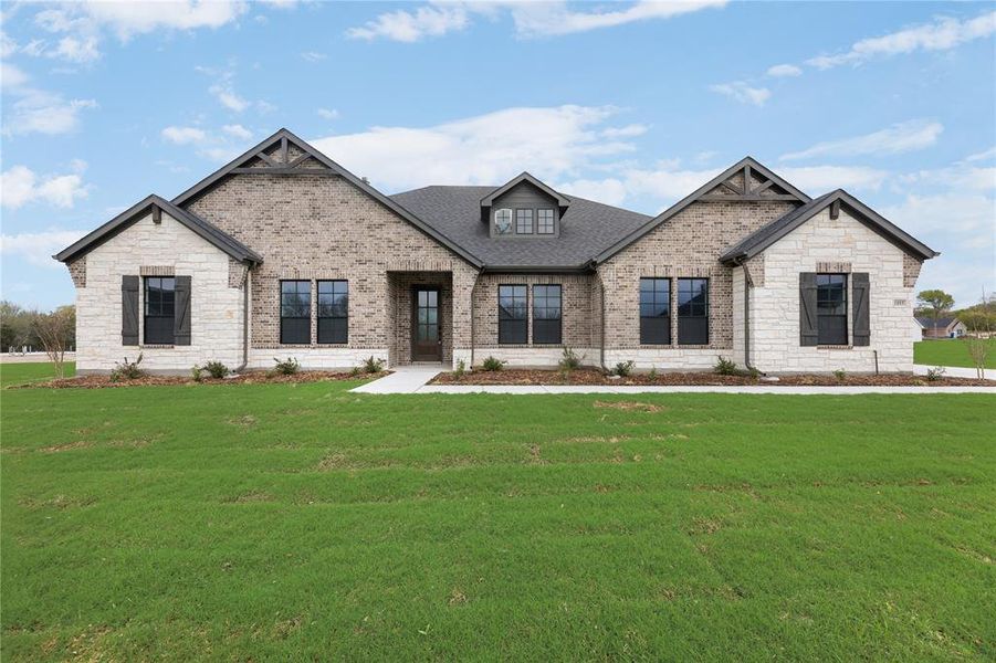 Front exterior of a new home in King Crossing Estates, Van Alstyne, TX, highlighting curb appeal (Image 1).