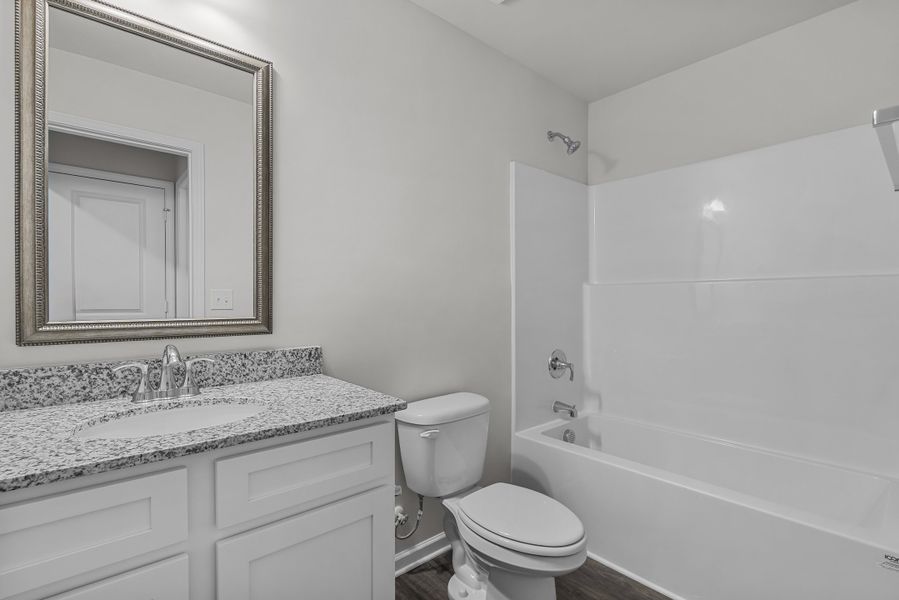 Representative furnished interior of a home built from the Holly A by McGuinn Homes in Willow Lake, Blythewood (Image 9).