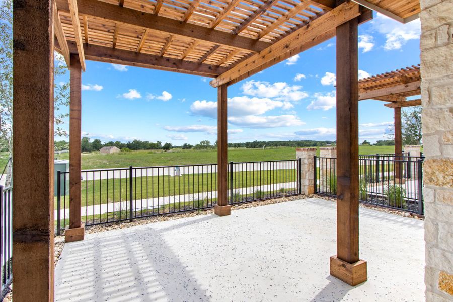 Exterior details and patio area of a home in The Tribute, The Colony (Image 27).