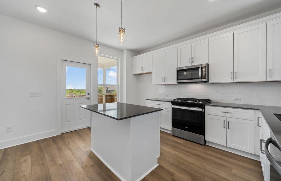 Furnished interior view inside a new home in Crosswinds, Kyle (Image 6).