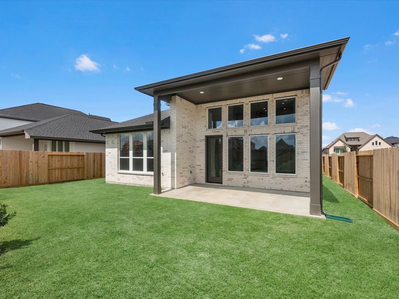 Exterior details and patio area of a home in Jubilee 50′, Hockley (Image 3).