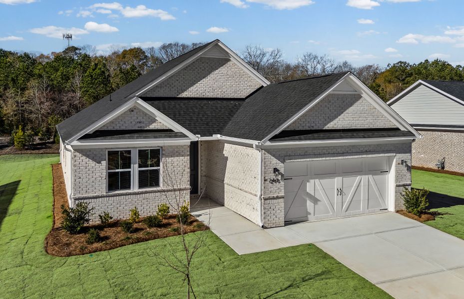 Front exterior of a new home in Overland, Locust Grove, GA, highlighting curb appeal (Image 30).