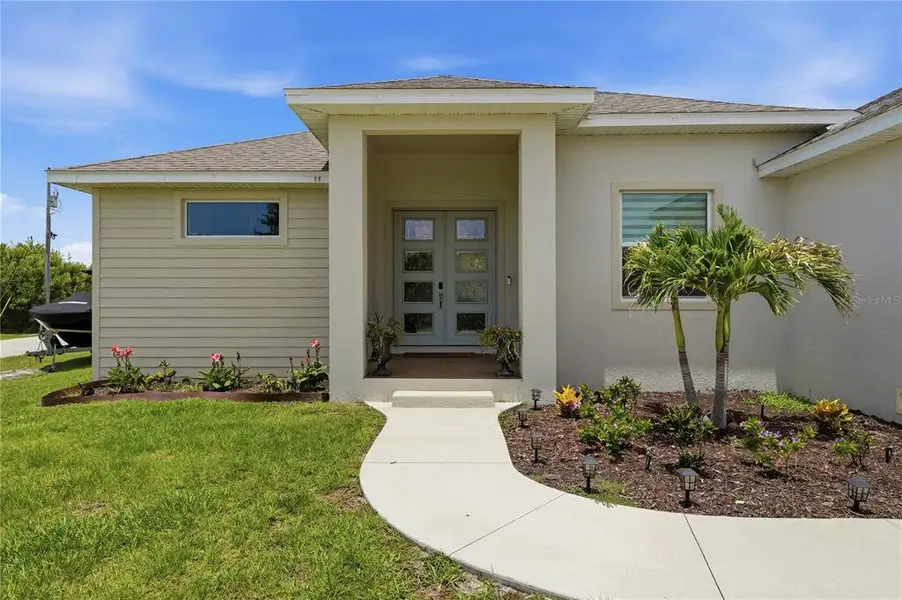 Exterior details and patio area of a home in , Port Charlotte (Image 3). Exterior details and patio area of a home in , Port Charlotte (Image 3).