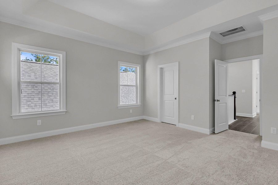Spacious, unfurnished interior of a new home in Tidewater at Lakes of Cane Bay, Summerville (Image 22). Spacious, unfurnished interior of a new home in Tidewater at Lakes of Cane Bay, Summerville (Image 22).