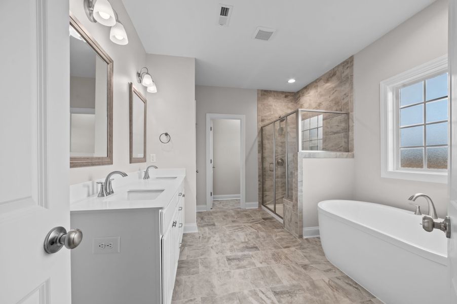 Furnished interior view inside a new home in The Preserve at Langston, Winterville (Image 12). Furnished interior view inside a new home in The Preserve at Langston, Winterville (Image 12).