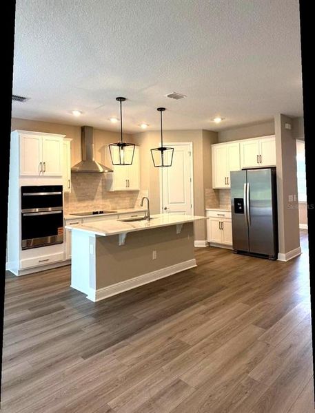 Furnished interior view inside a new home in Legends Preserve - Signature Series, Daytona Beach (Image 8).