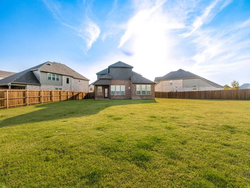 Front exterior of a new home in , McKinney, TX, highlighting curb appeal (Image 2).