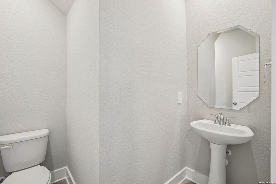 Furnished interior view inside a new home in Legendary Trails - Premier Series, Cibolo (Image 8).