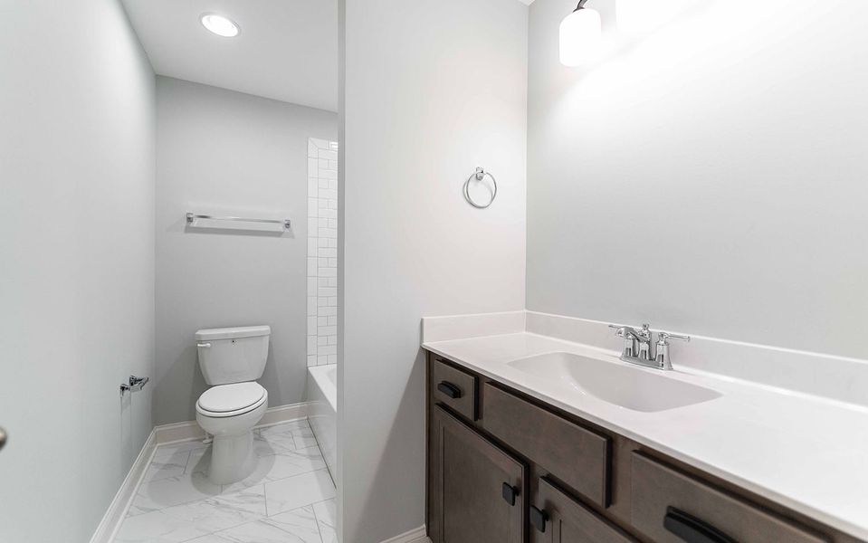 Furnished interior view inside a new home in Aden Woods, Fairview (Image 11).