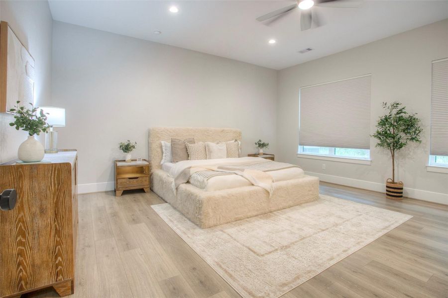 This lovely room is perfect for a MIL suite.  It's large enough for a sitting area, has a walk in closet and en suite bath.  Even has it's own door to the screened in porch.