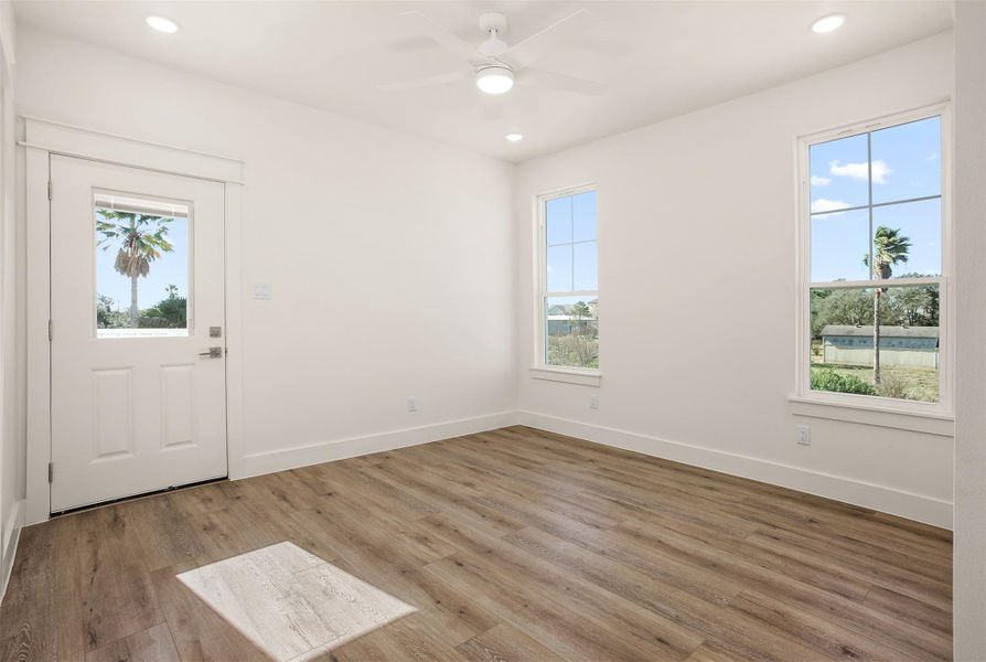 Bedroom 4 (downstairs) is a second primary or guest suite