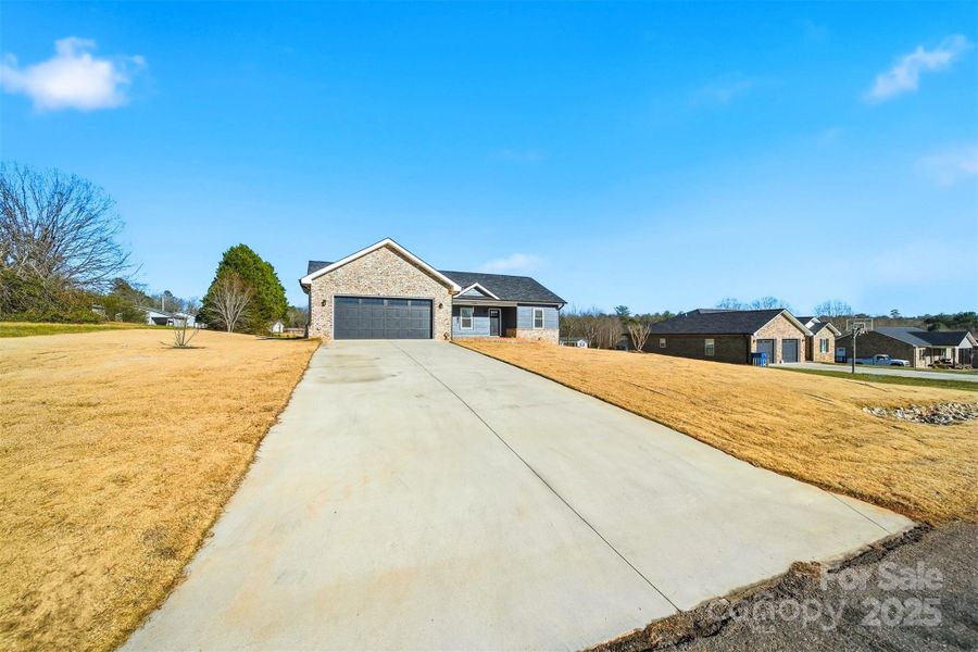 Front exterior of a new home in , Granite Falls, NC, highlighting curb appeal (Image 2).