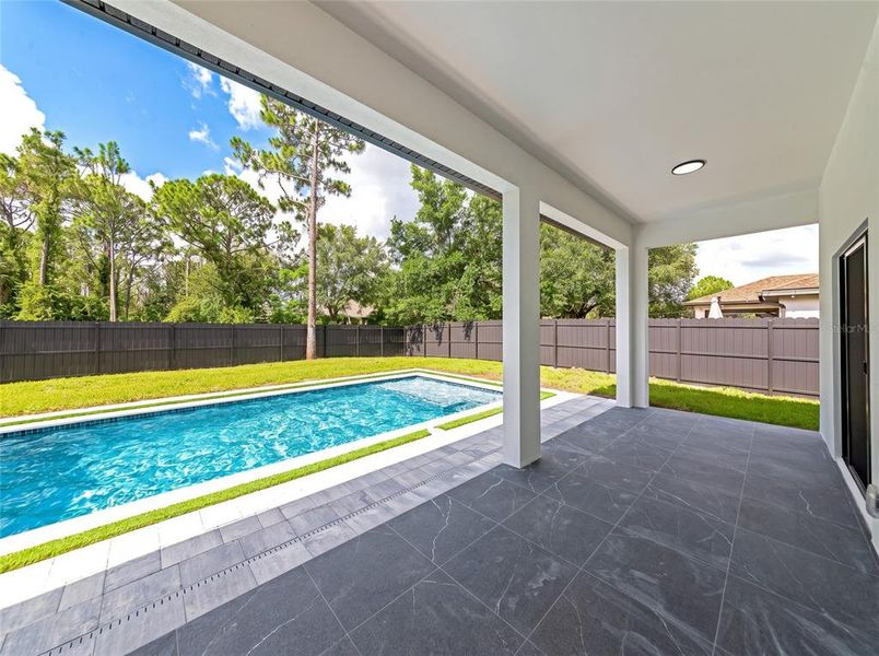Exterior details and patio area of a home in , North Port (Image 21).