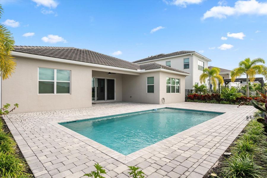 Exterior details and patio area of a home in , The Acreage (Image 27).