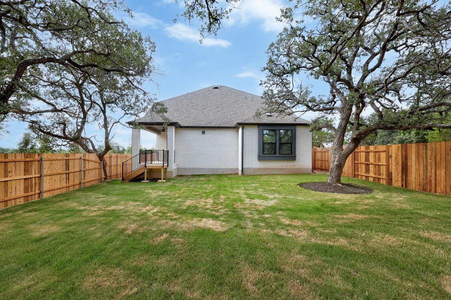 Exterior details and patio area of a home in Parkside Peninsula, Georgetown (Image 14).