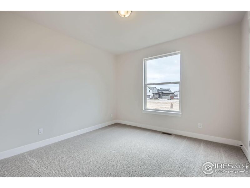 Spacious, unfurnished interior of a new home in RainDance National 60/70, Windsor (Image 19).