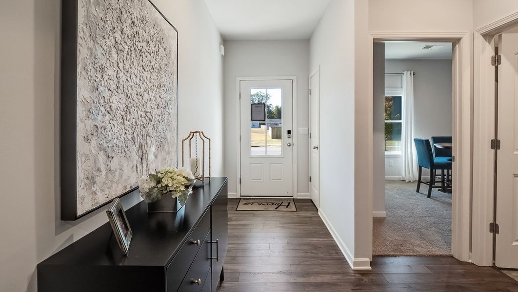 Representative furnished interior of a home built from the Lacombe by D.R. Horton in Village Park, Oakland (Image 4).