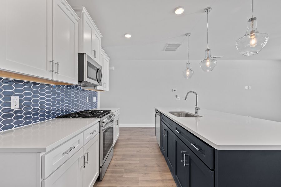 Representative furnished interior of a home built from the The Hemlock by RobuckHomes in Kennebec Crossing, Angier (Image 12).