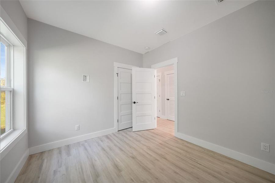 Spacious, unfurnished interior of a new home in , Port Charlotte (Image 15).