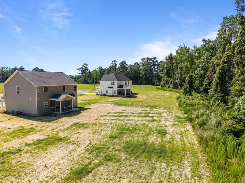 Front exterior of a new home in Laurel Oaks, Greenville, NC, highlighting curb appeal (Image 39). Front exterior of a new home in Laurel Oaks, Greenville, NC, highlighting curb appeal (Image 39).