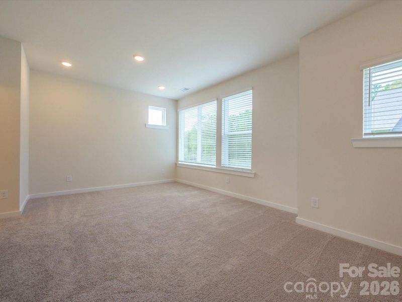 Spacious, unfurnished interior of a new home in Central Living at Craig, Charlotte (Image 30).