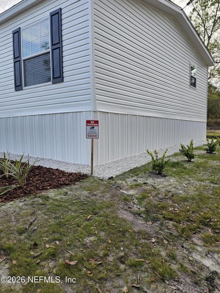 Exterior details and patio area of a home in , Hawthorne (Image 9).