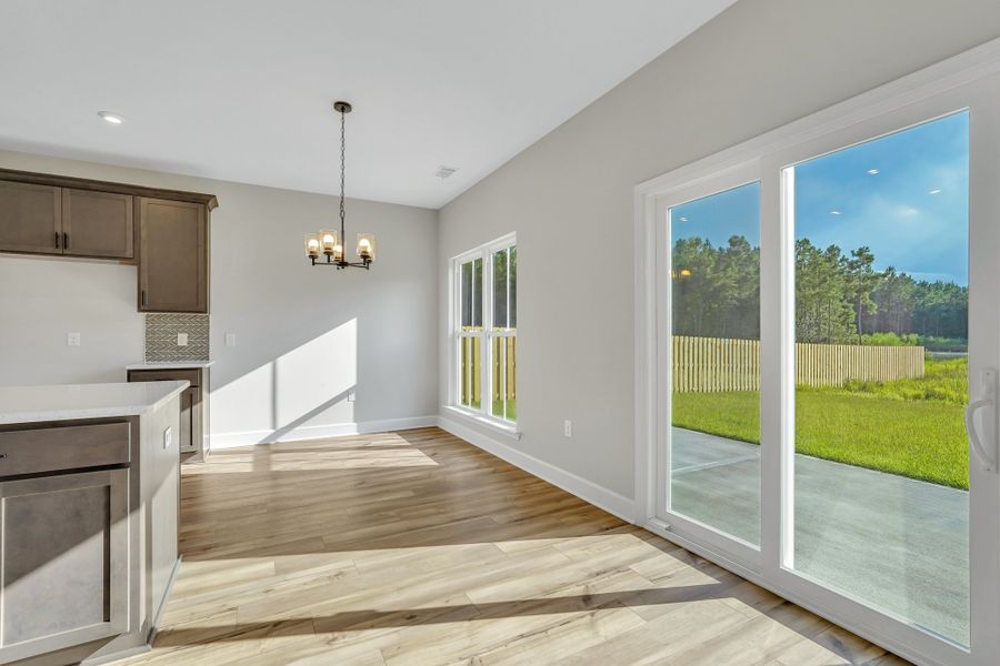 Edisto Breakfast Area with Natural Light and Patio View