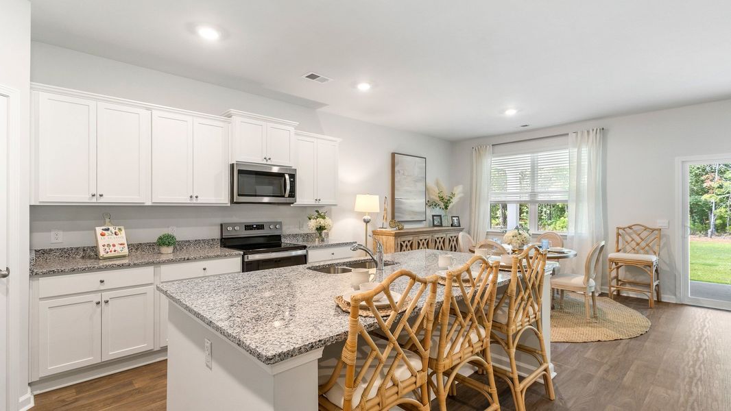 Furnished interior view inside a new home in Pine Hills at Cane Bay, Summerville (Image 15). Furnished interior view inside a new home in Pine Hills at Cane Bay, Summerville (Image 15).