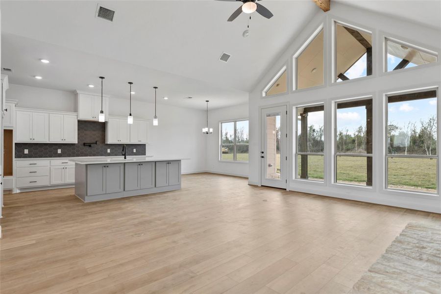 Living area with vaulted ceiling and architectural character.