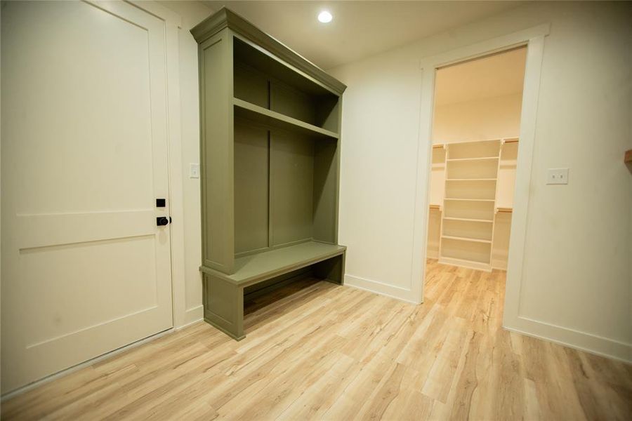 Mudroom featuring baseboards, light wood-style flooring, and recessed lighting Mudroom featuring baseboards, light wood-style flooring, and recessed lighting