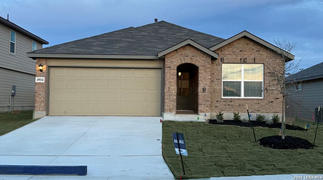 Front exterior of a new home in Riverstone at Westpointe, San Antonio, TX, highlighting curb appeal (Image 2). Front exterior of a new home in Riverstone at Westpointe, San Antonio, TX, highlighting curb appeal (Image 2).