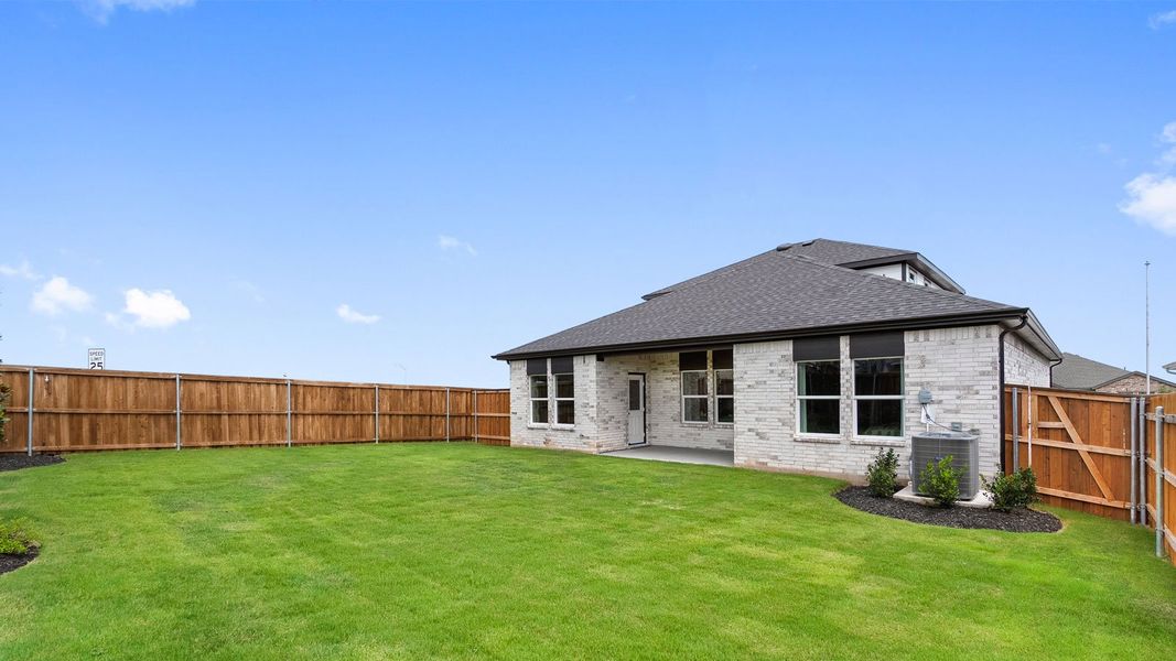 Exterior details and patio area of a home in Thunder Rock, Marble Falls (Image 26).