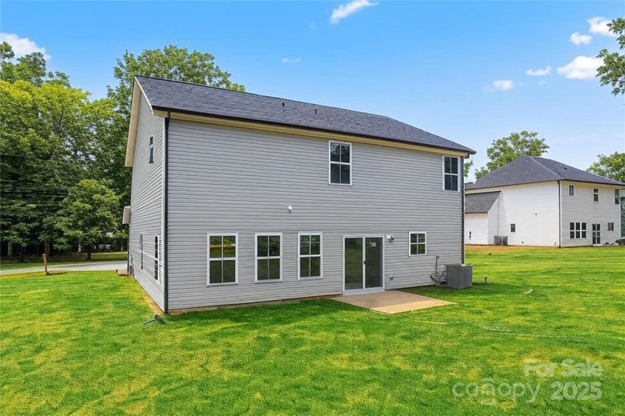 Front exterior of a new home in , Harrisburg, NC, highlighting curb appeal (Image 1).