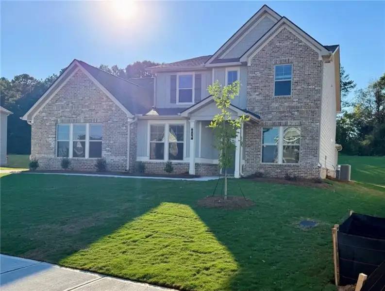 Exterior details and patio area of a home in Grandview at Millers Mill, Stockbridge (Image 17).