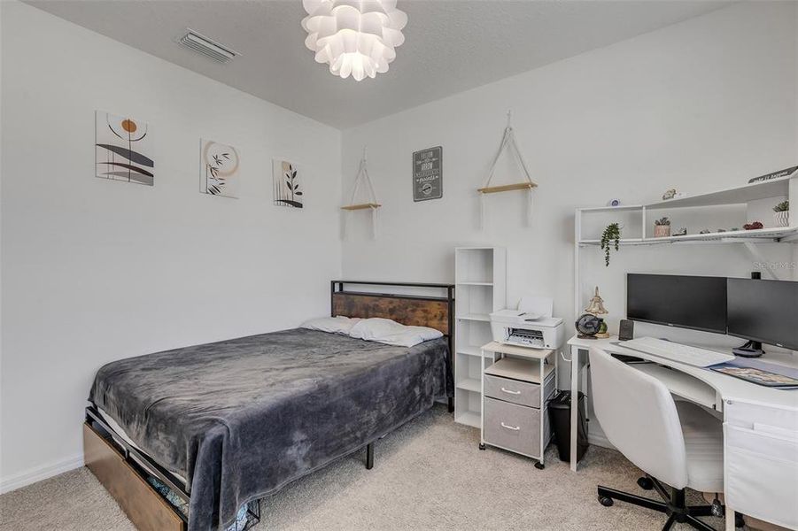 Furnished interior view inside a new home in Groveside at Ormond Station, Ormond Beach (Image 40).