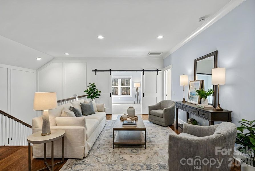 Virtually staged upper level loft area Virtually staged upper level loft area