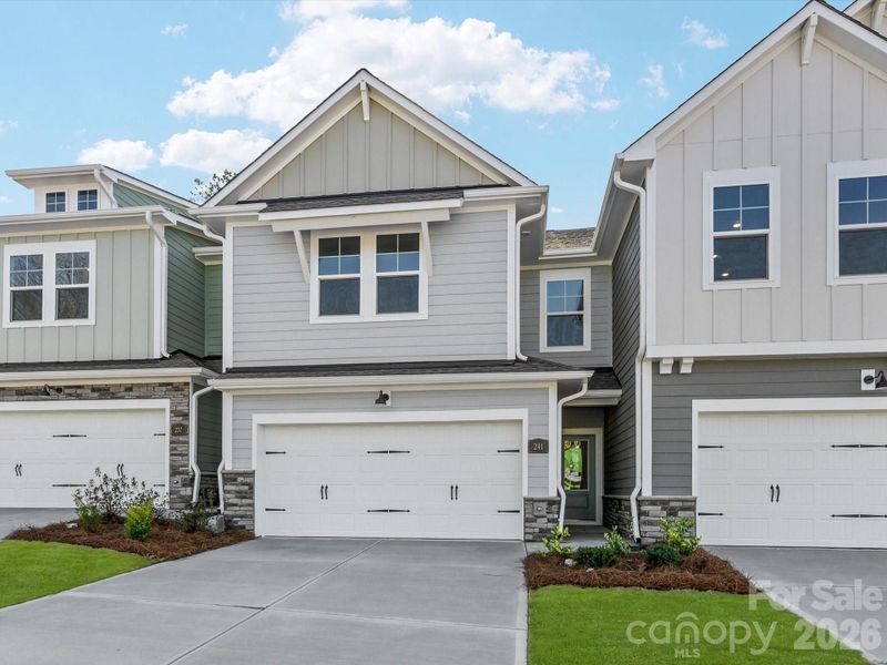 2 car side by side garage and driveway with ample parking for you and your guests