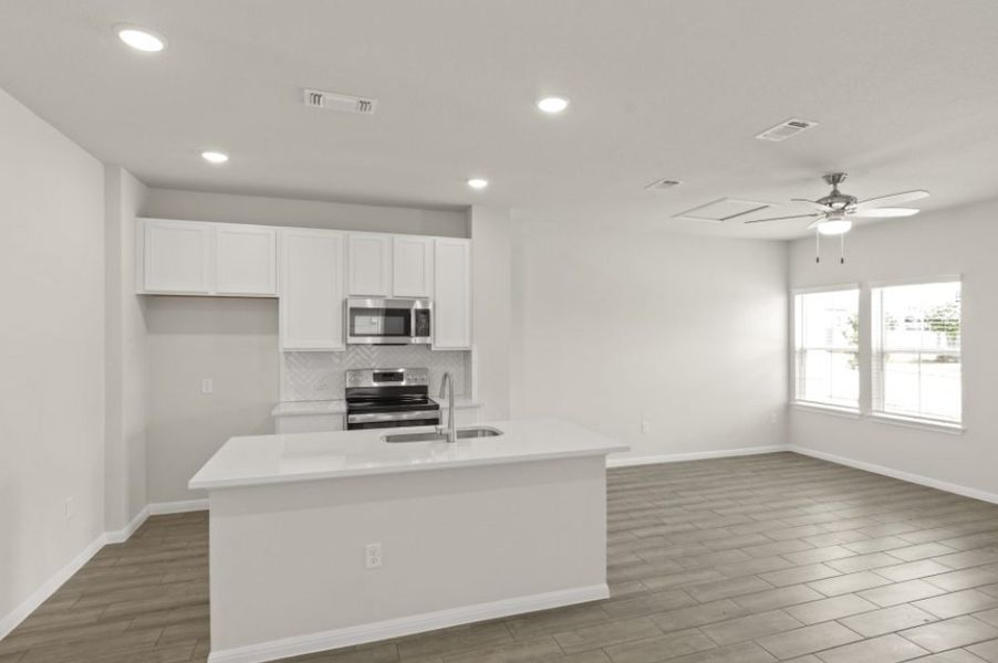 Furnished interior view inside a new home in Whisper Valley, Manor (Image 4).