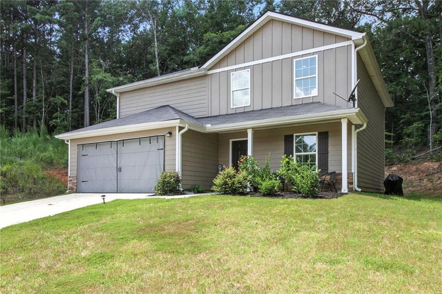 Front exterior of a new home in , Dallas, GA, highlighting curb appeal (Image 20).