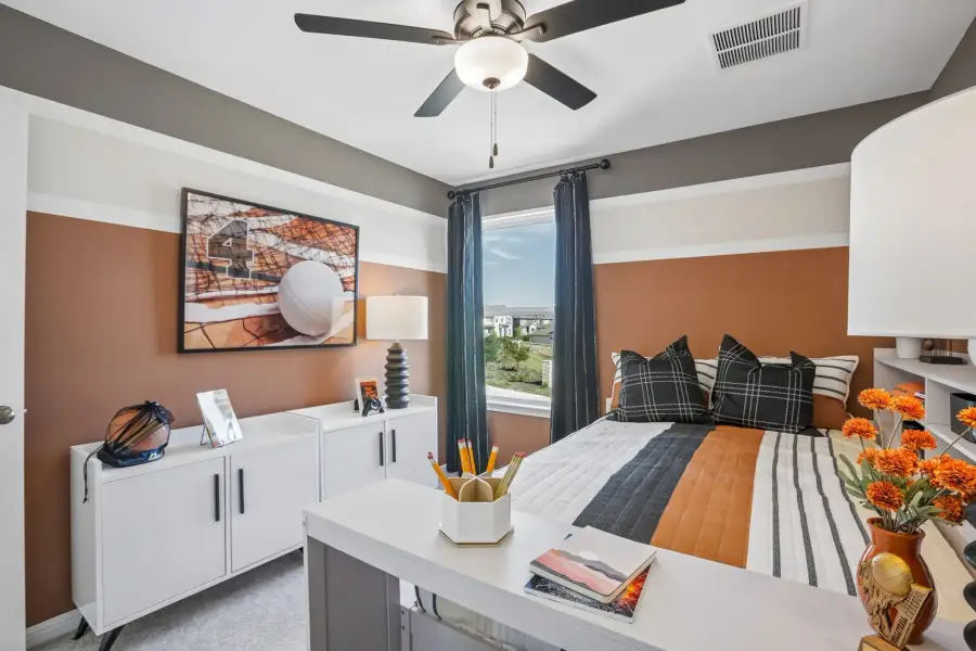 Representative furnished interior of a home built from the Sparrow by Taylor Morrison in Longview, Del Valle (Image 34).